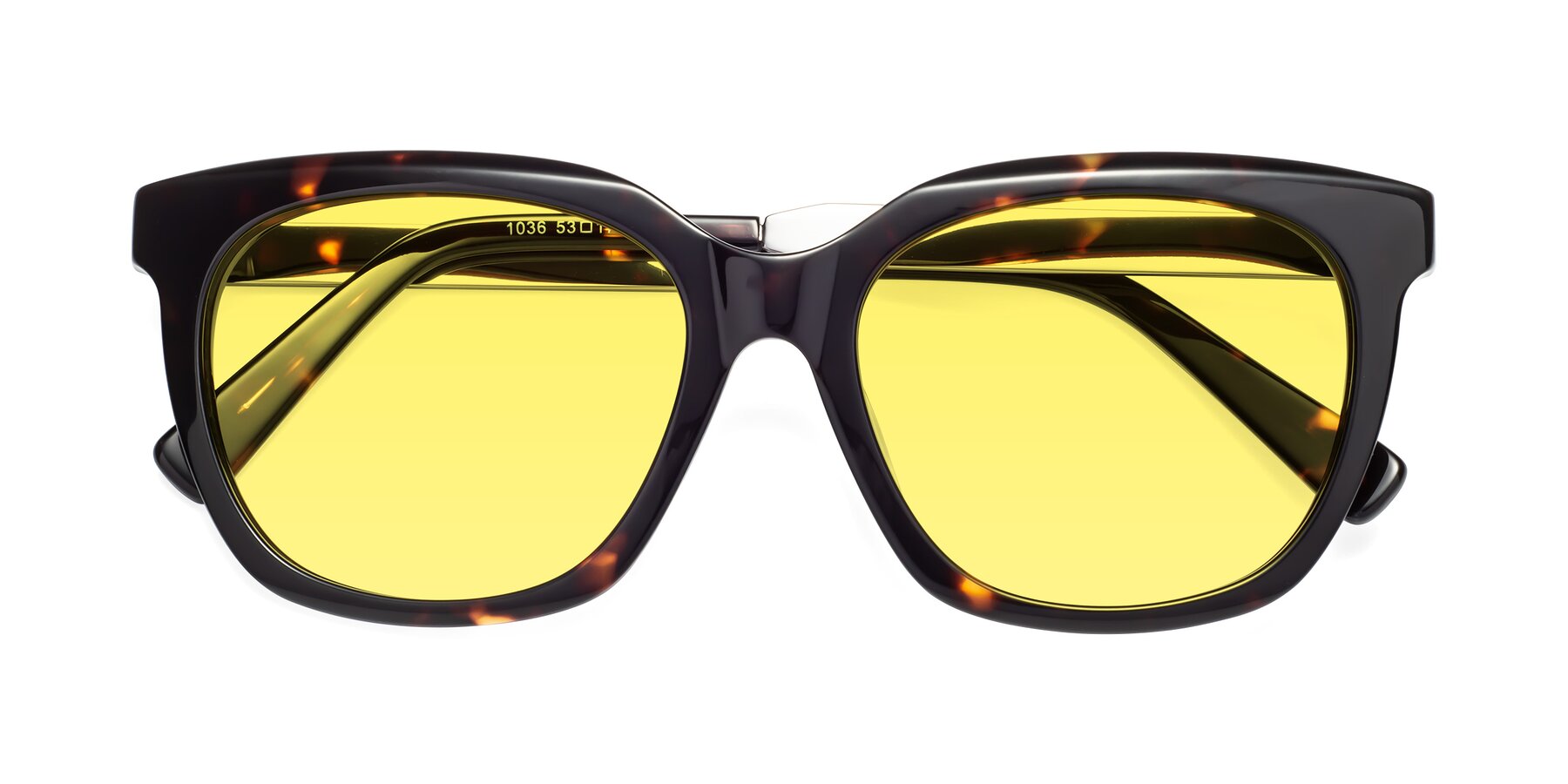 Folded Front of Talent in Tortoise with Medium Yellow Tinted Lenses