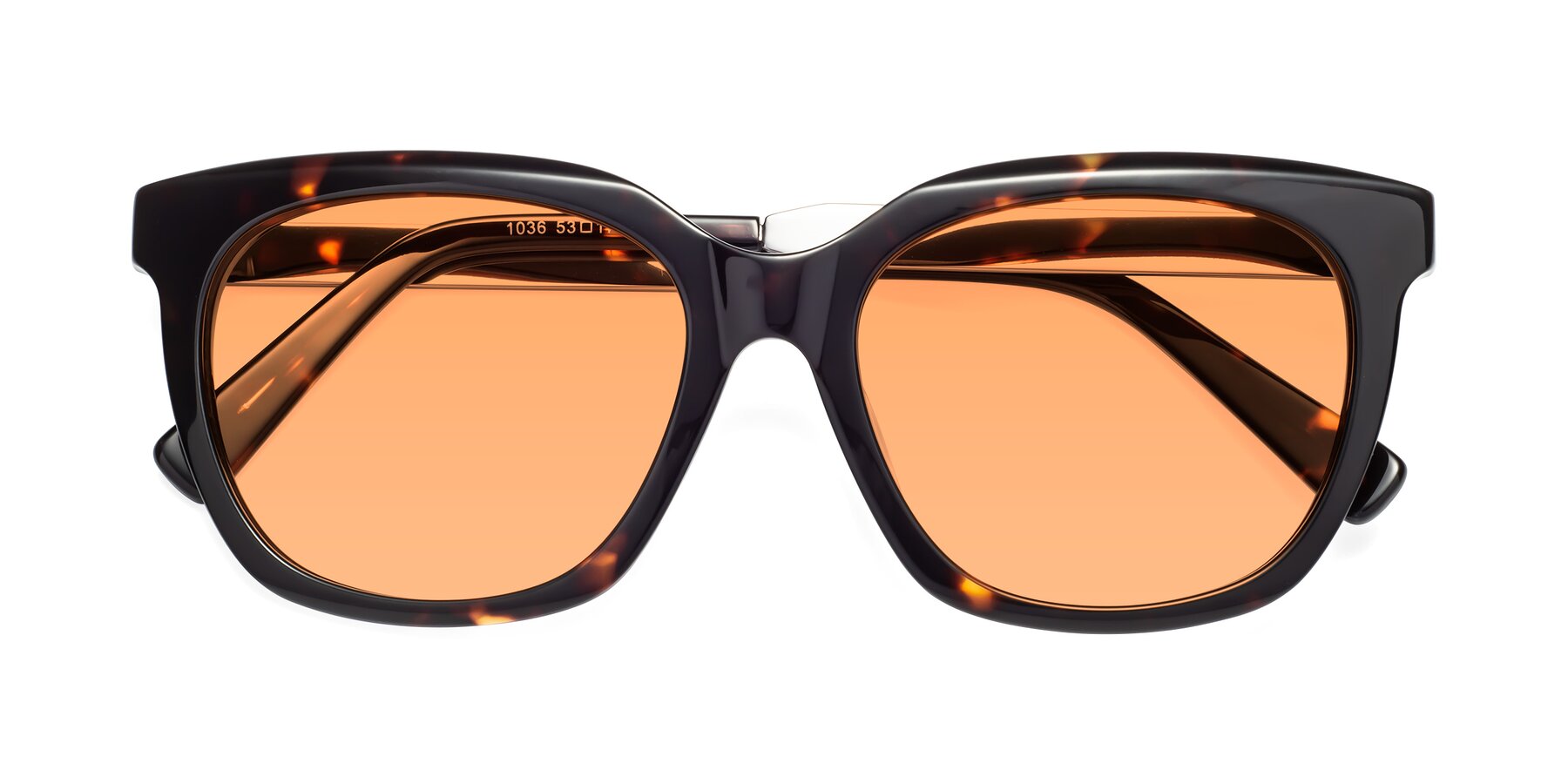 Folded Front of Talent in Tortoise with Medium Orange Tinted Lenses