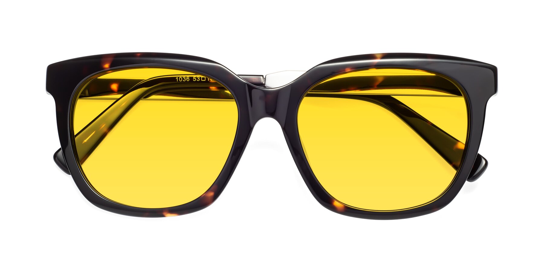 Folded Front of Talent in Tortoise with Yellow Tinted Lenses
