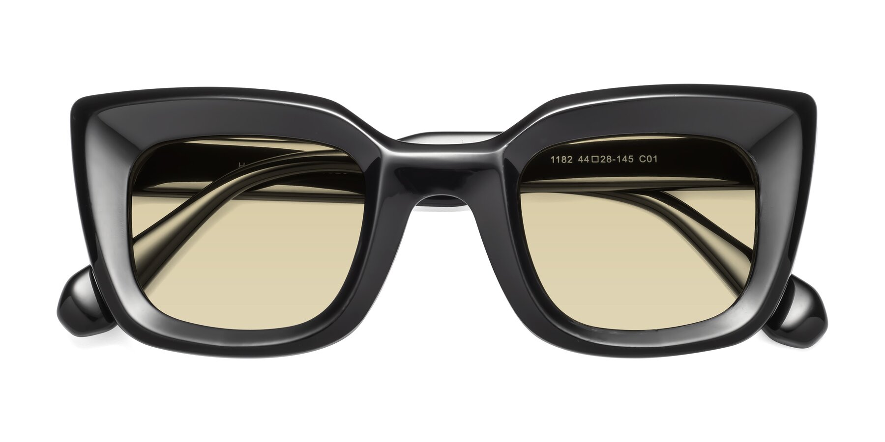 Folded Front of Homan in Black with Light Champagne Tinted Lenses