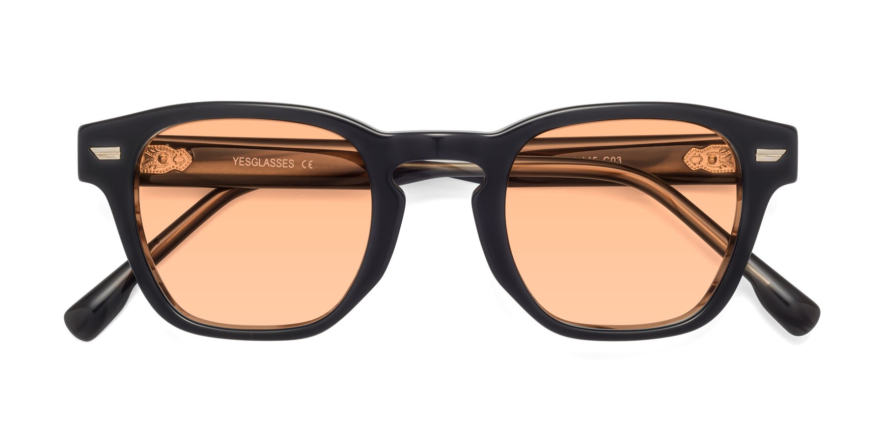 Folded Front of 1421 in Black-Stripe Brown with Light Orange Tinted Lenses