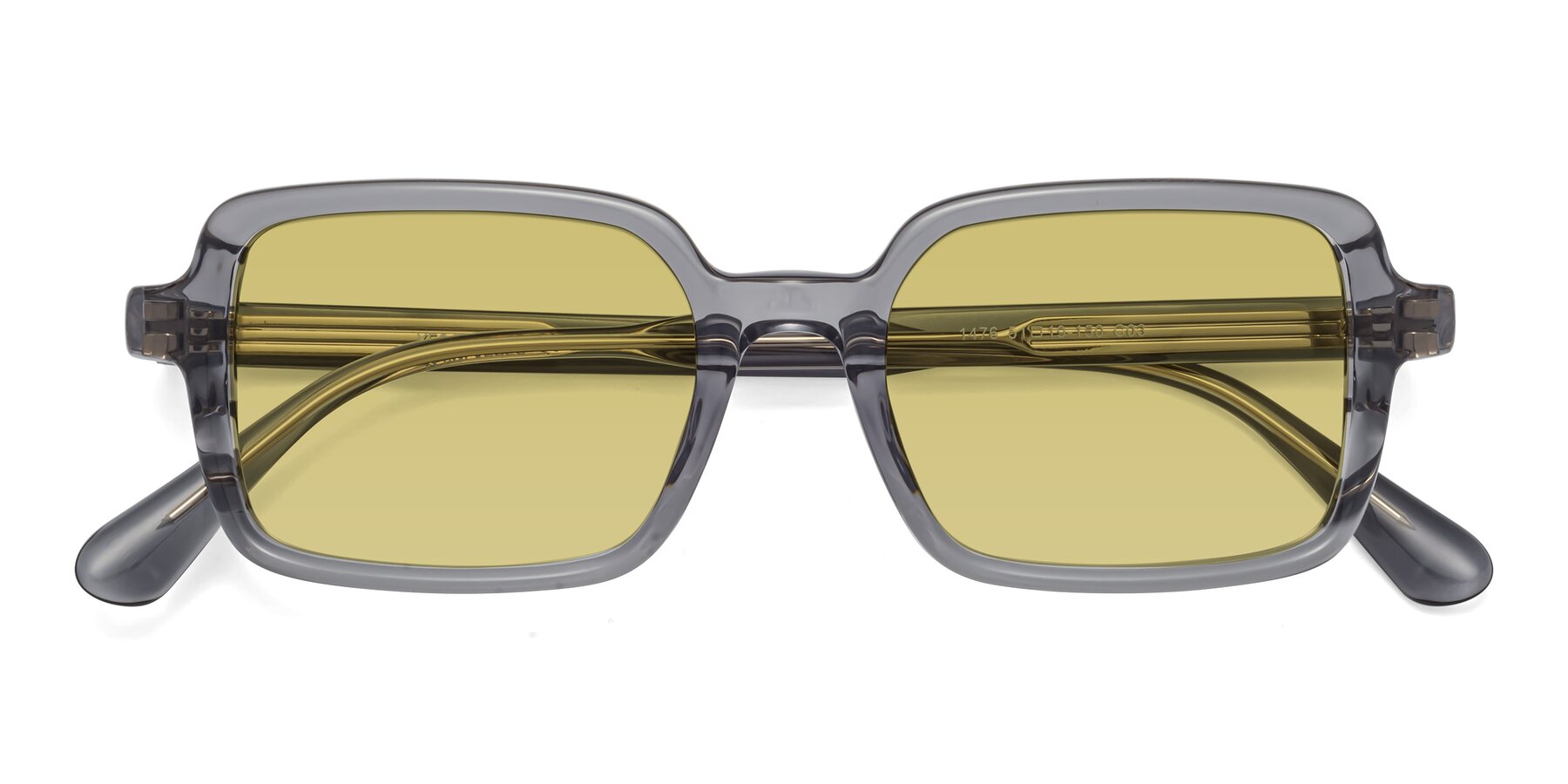 Folded Front of Canuto in Transparent Gray with Medium Champagne Tinted Lenses