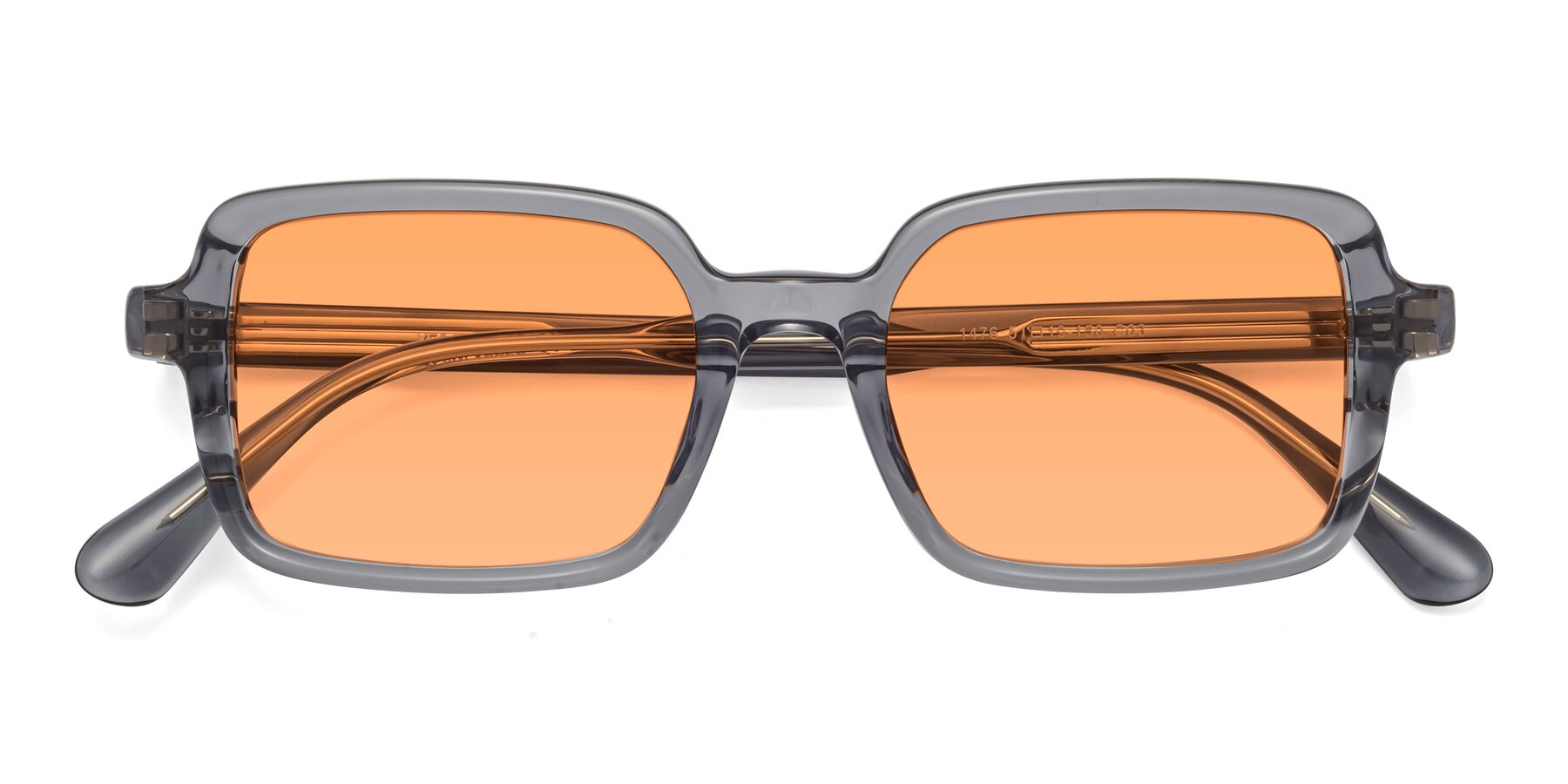 Folded Front of Canuto in Transparent Gray with Medium Orange Tinted Lenses
