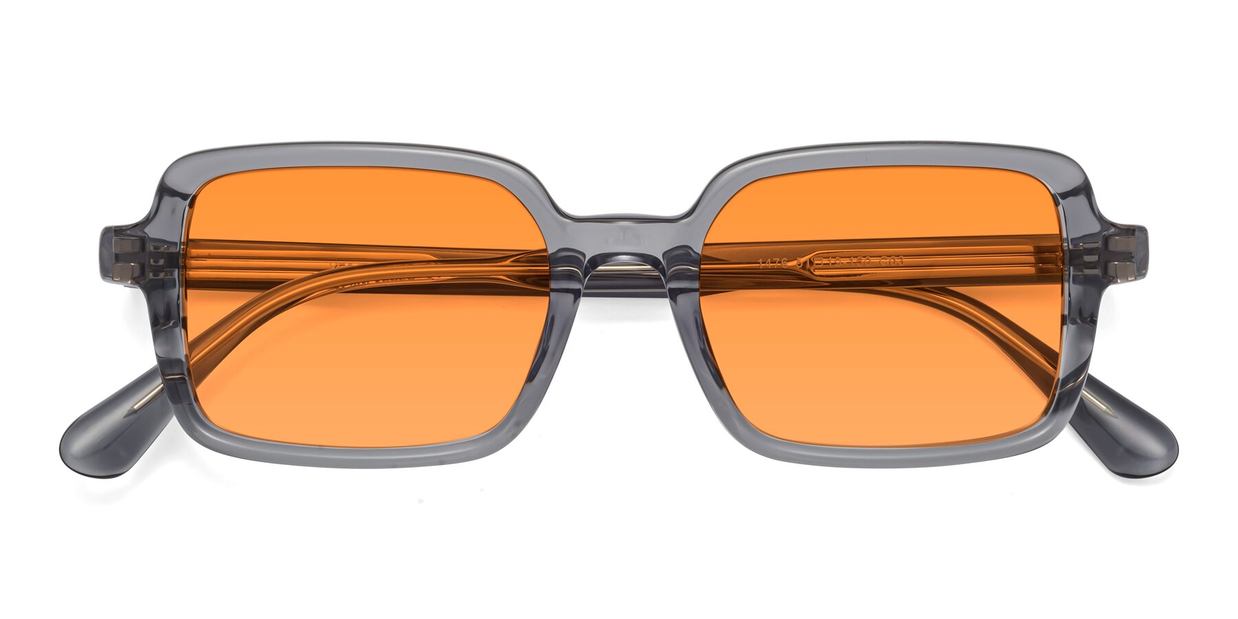 Folded Front of Canuto in Transparent Gray with Orange Tinted Lenses