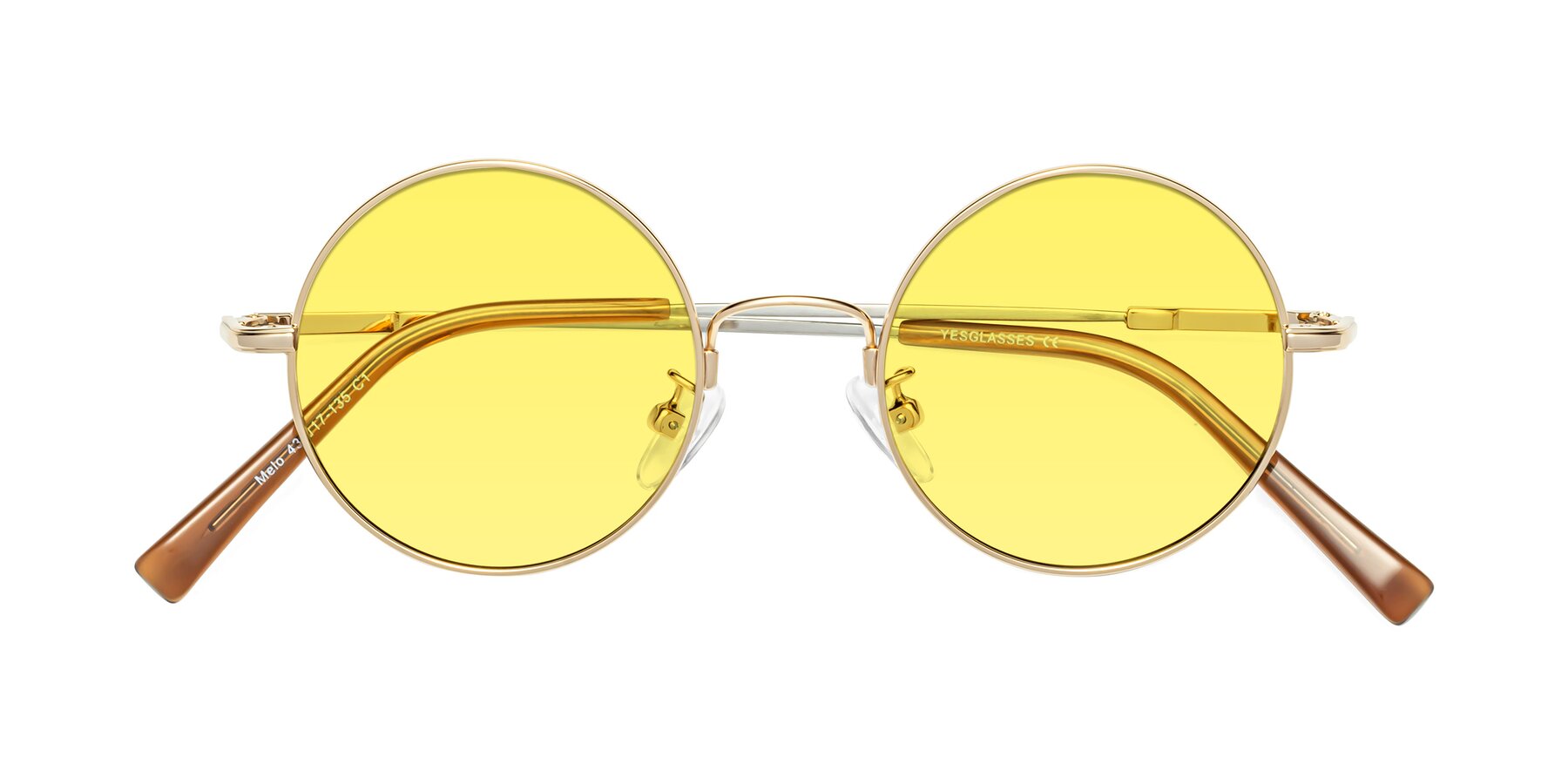 Folded Front of Melo in Gold with Medium Yellow Tinted Lenses
