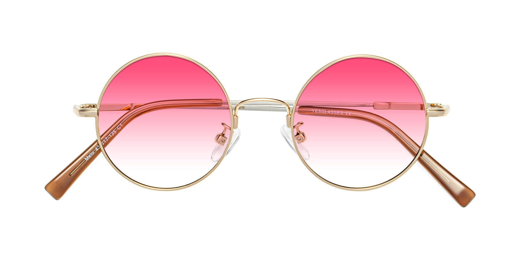 Folded Front of Melo in Gold with Pink Gradient Lenses