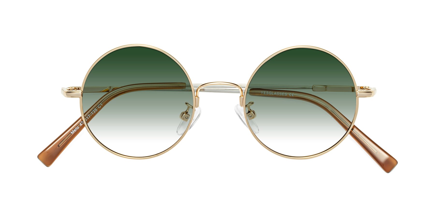 Folded Front of Melo in Gold with Green Gradient Lenses