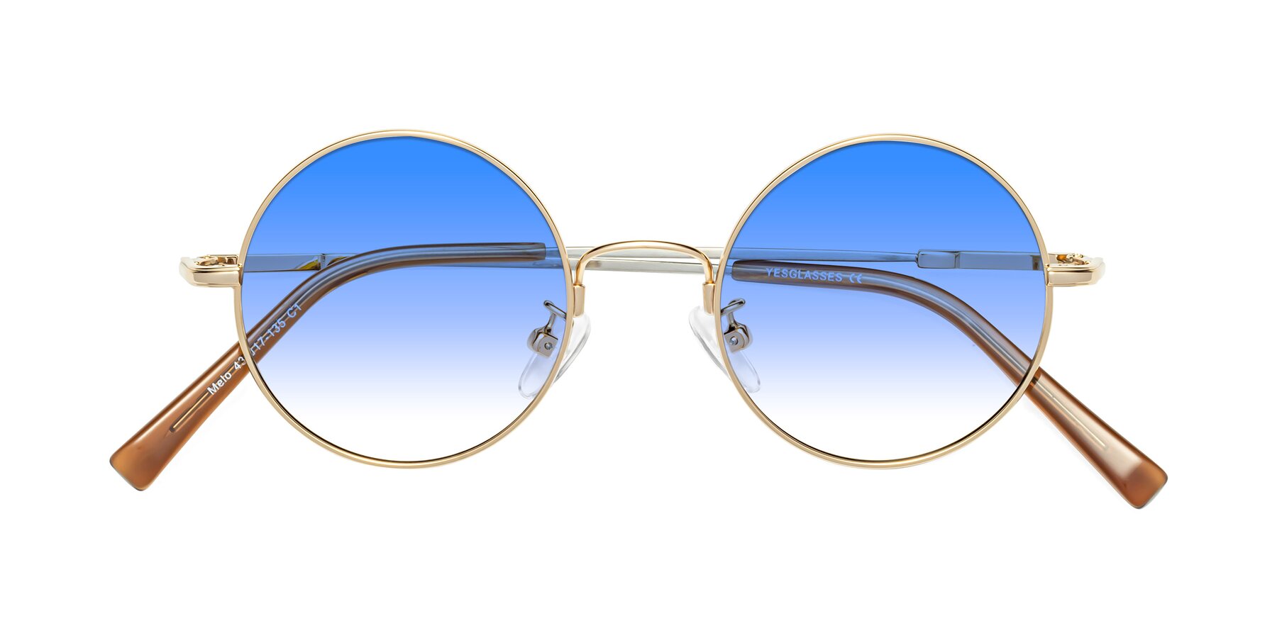 Folded Front of Melo in Gold with Blue Gradient Lenses