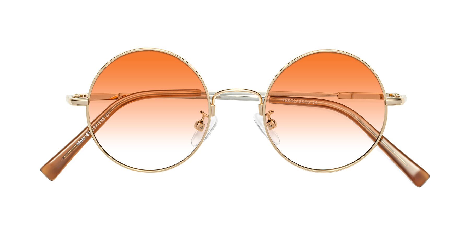 Folded Front of Melo in Gold with Orange Gradient Lenses