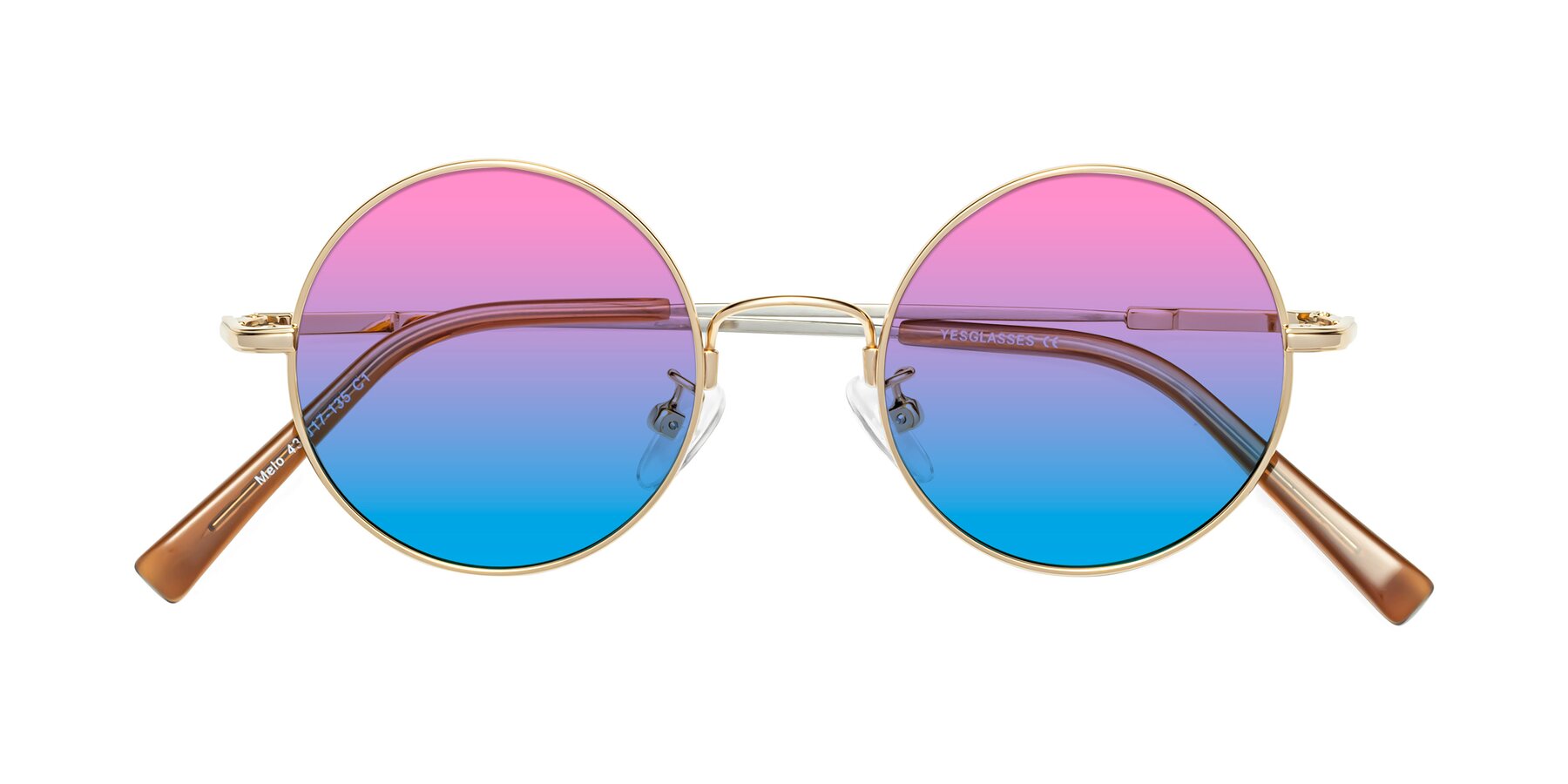 Folded Front of Melo in Gold with Pink / Blue Gradient Lenses