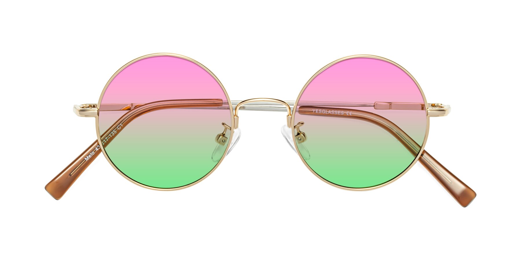 Folded Front of Melo in Gold with Pink / Green Gradient Lenses