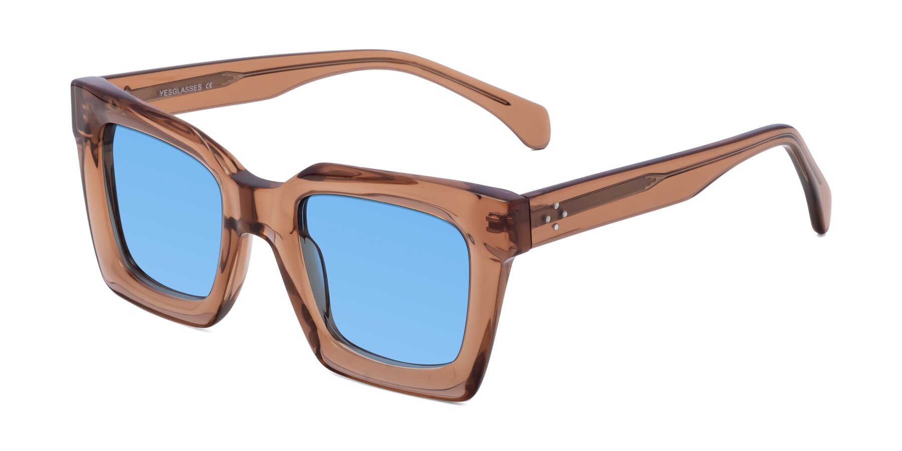 Angle of Piper in Caramel with Medium Blue Tinted Lenses