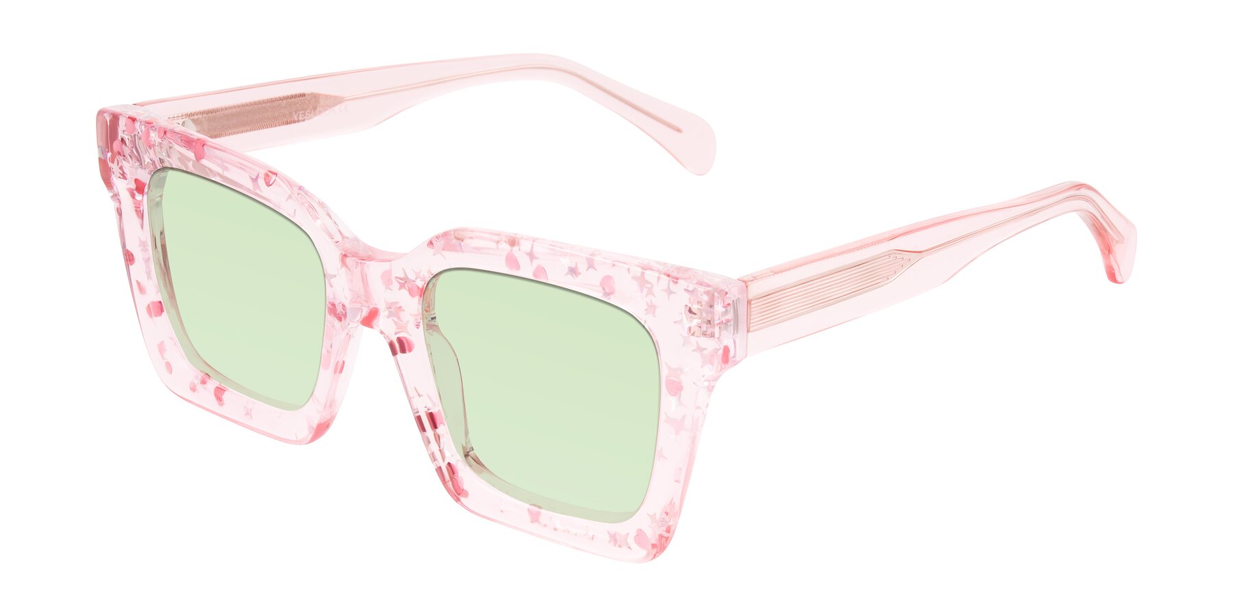 Angle of Piper in Sparkling Blush with Light Green Tinted Lenses