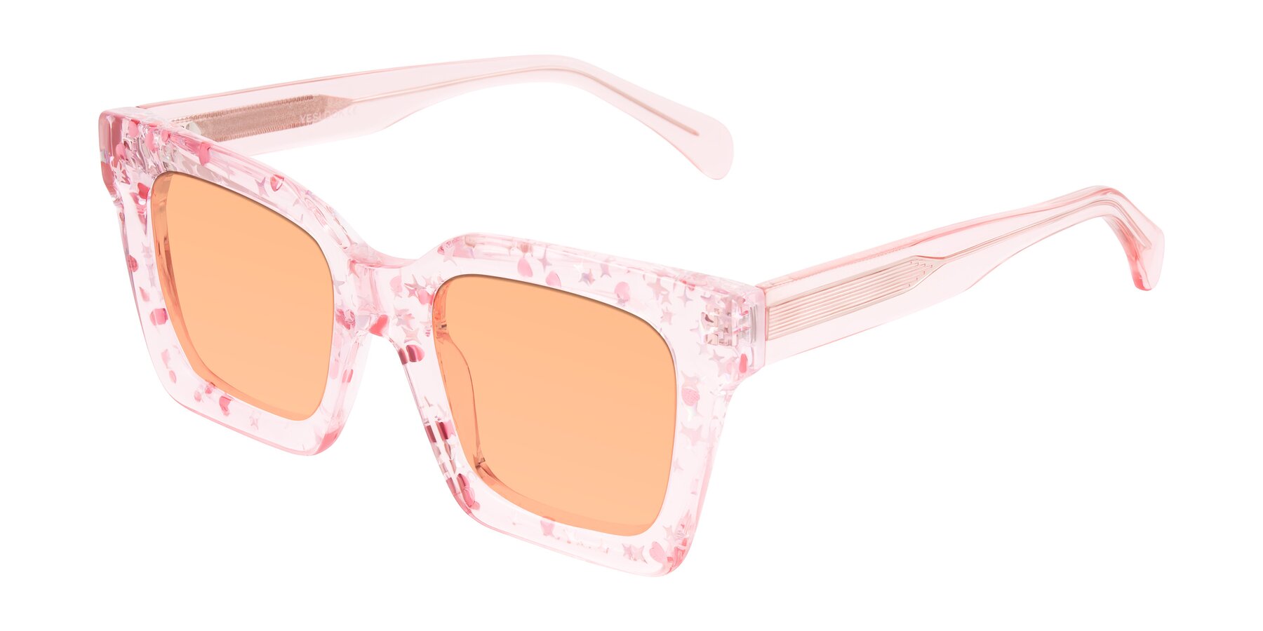 Angle of Piper in Sparkling Blush with Light Orange Tinted Lenses