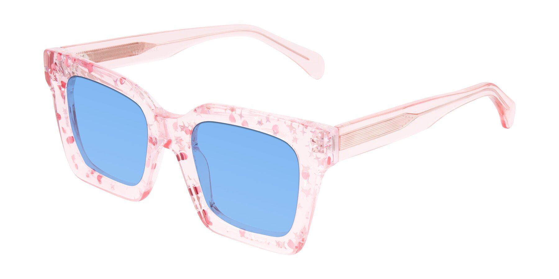 Angle of Piper in Sparkling Blush with Medium Blue Tinted Lenses