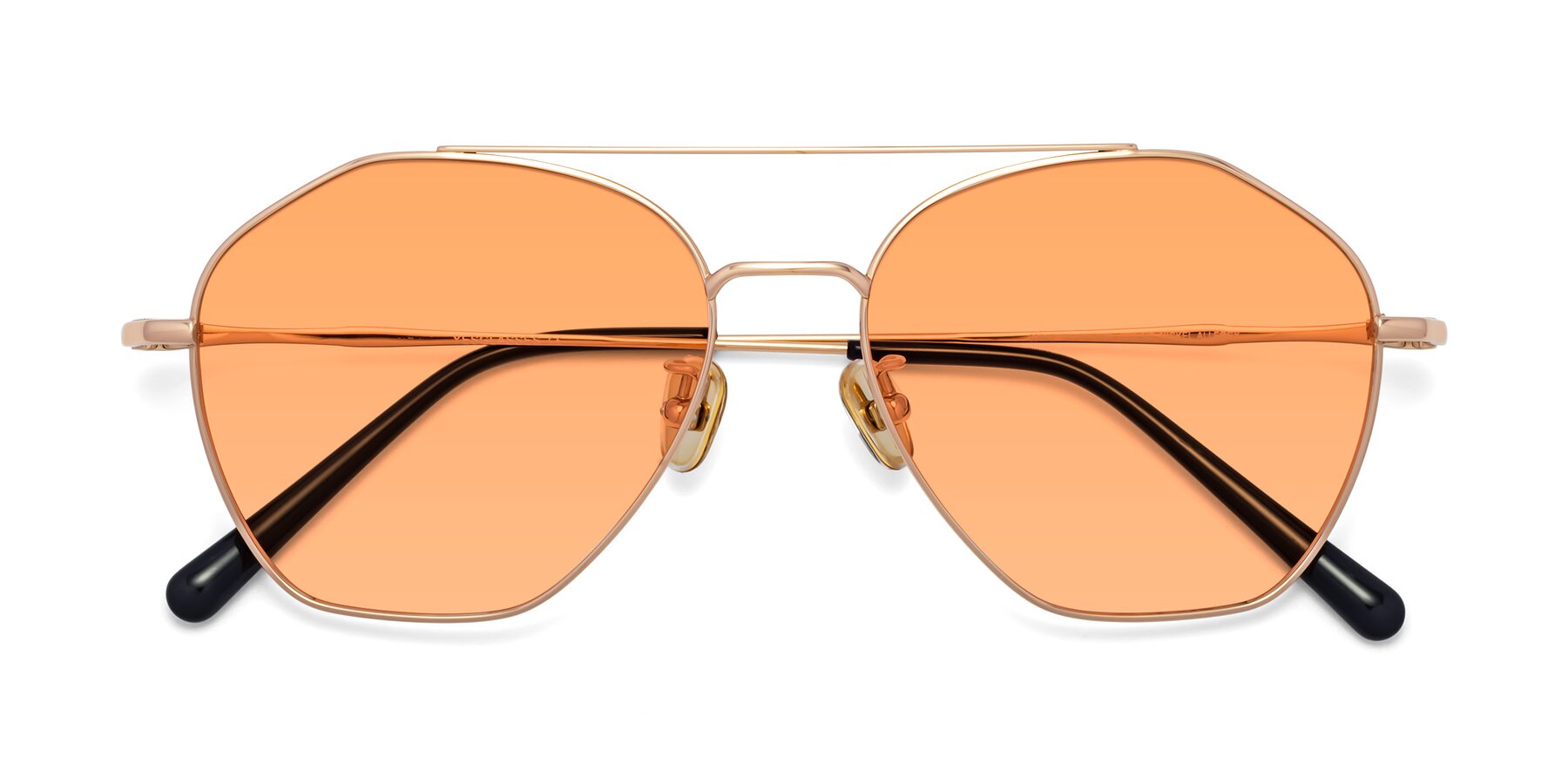 Folded Front of Linton in Rose Gold with Medium Orange Tinted Lenses