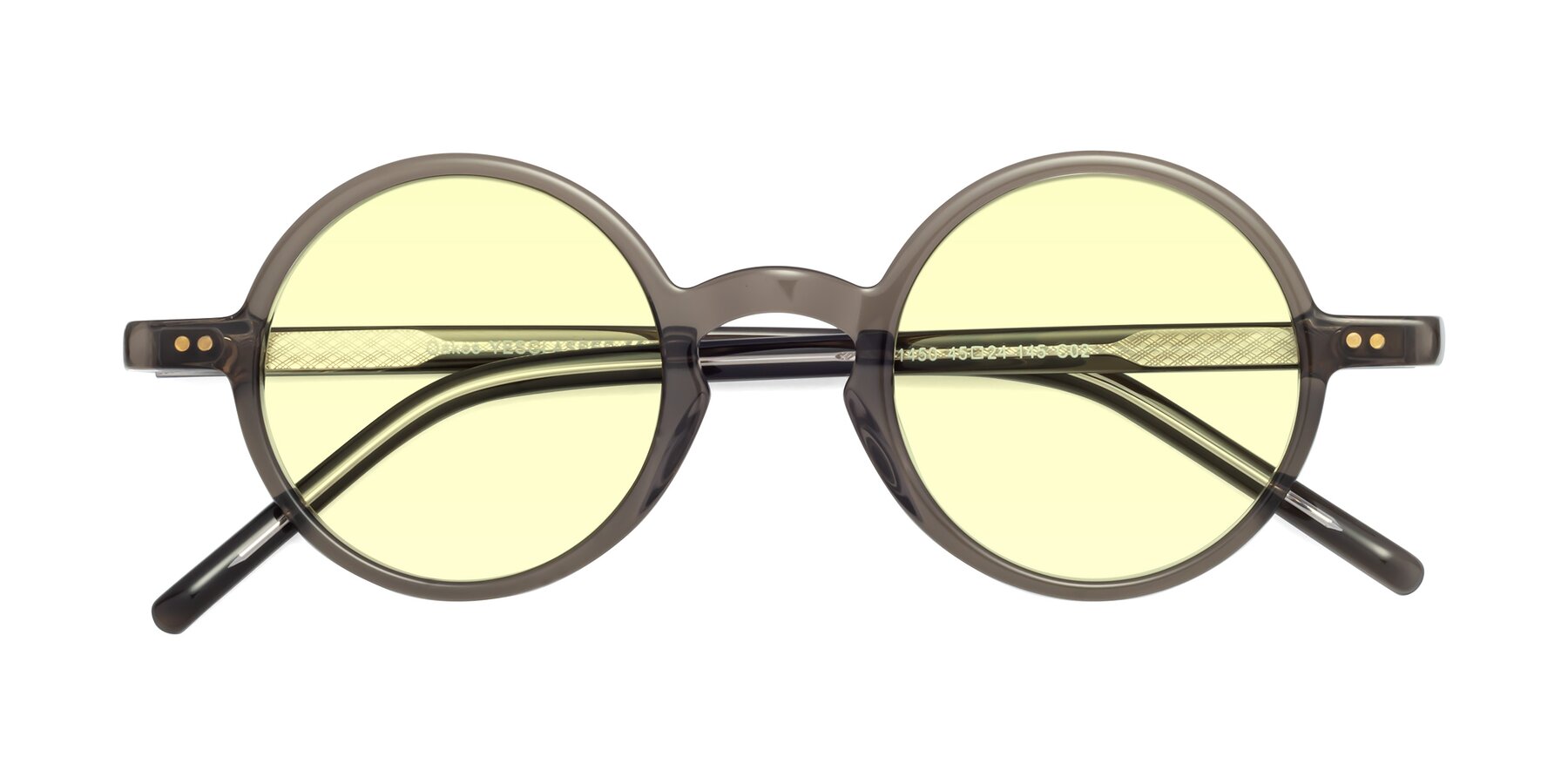 Folded Front of Oakes in Ash Gray with Light Yellow Tinted Lenses