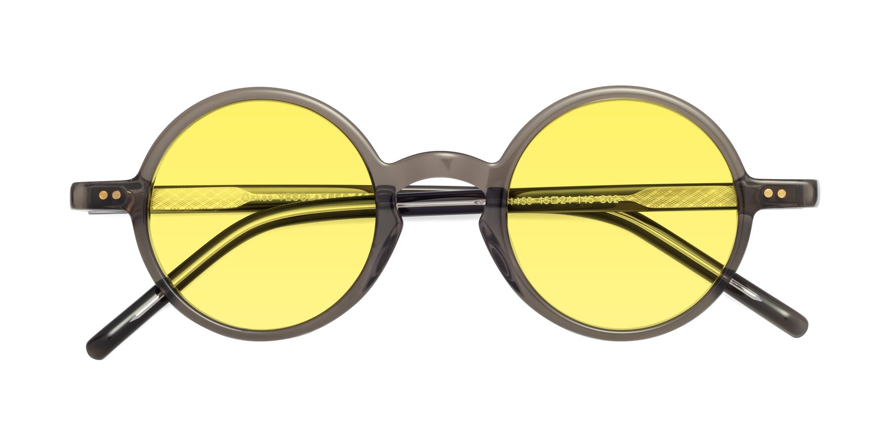 Folded Front of Oakes in Ash Gray with Medium Yellow Tinted Lenses