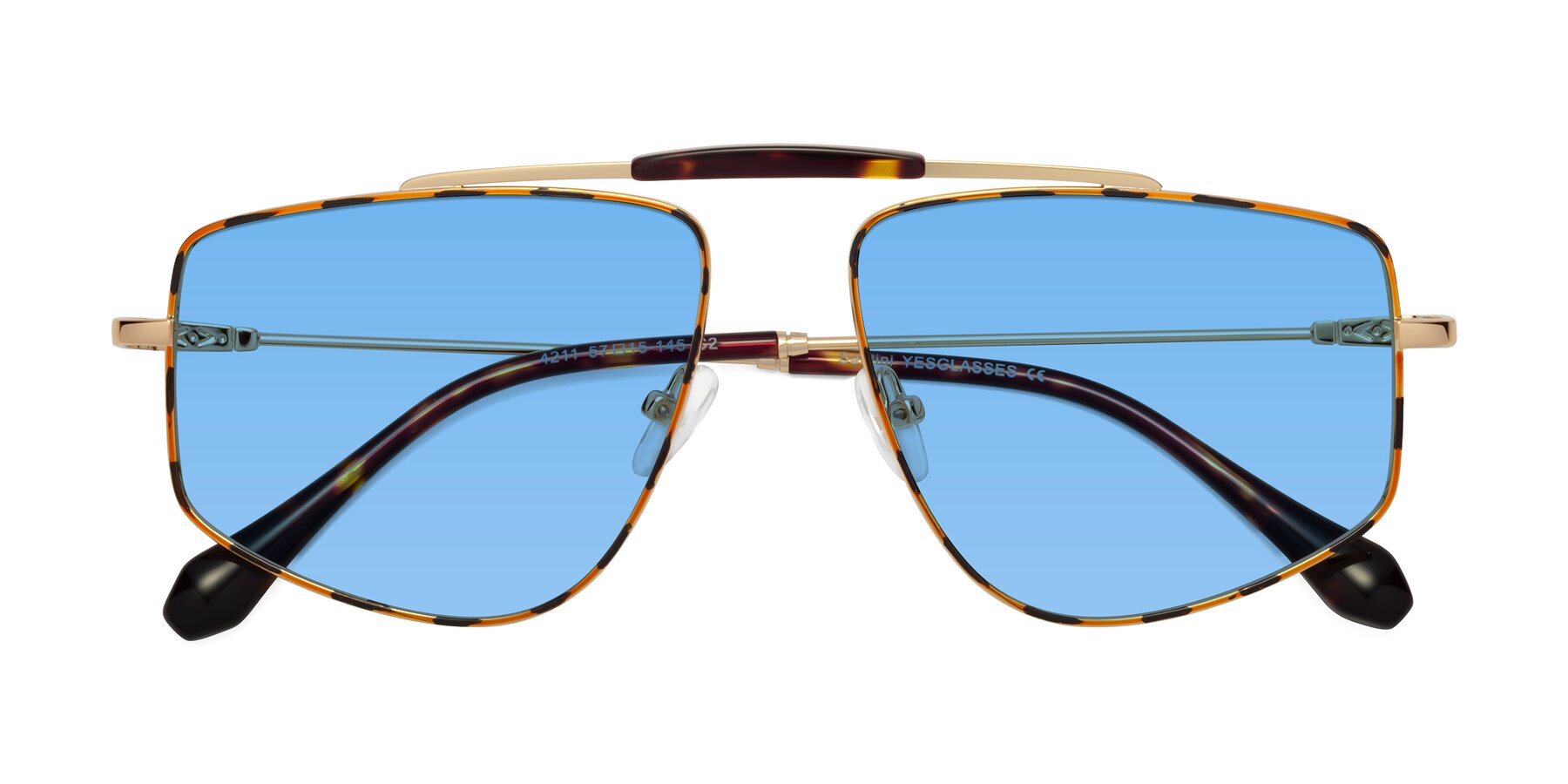 Folded Front of Santini in Leopard-Print-Gold with Medium Blue Tinted Lenses