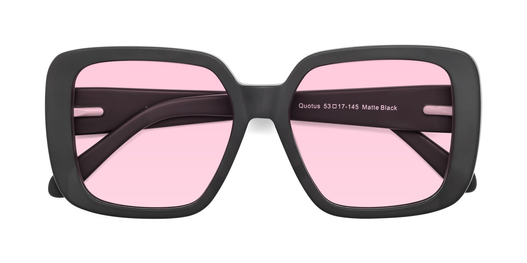 Folded Front of Quotus in Matte Black with Light Pink Tinted Lenses