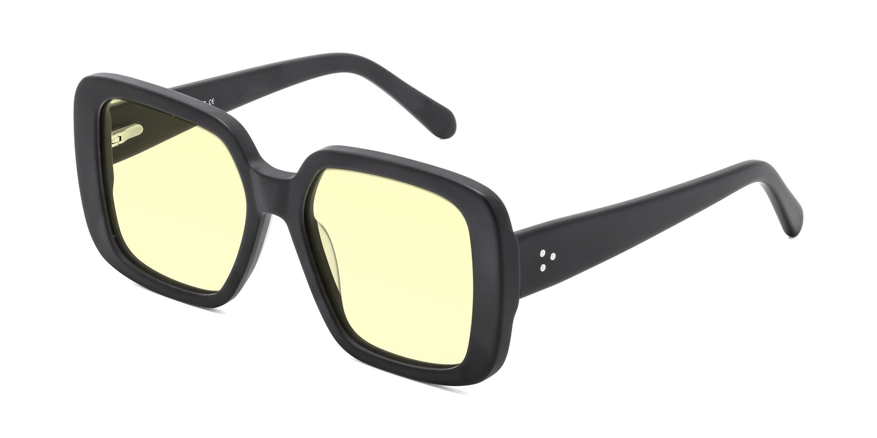Angle of Quotus in Matte Black with Light Yellow Tinted Lenses