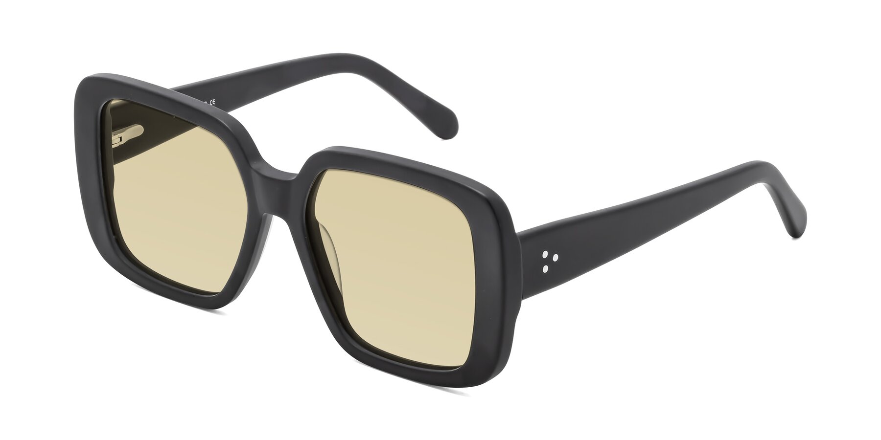 Angle of Quotus in Matte Black with Light Champagne Tinted Lenses