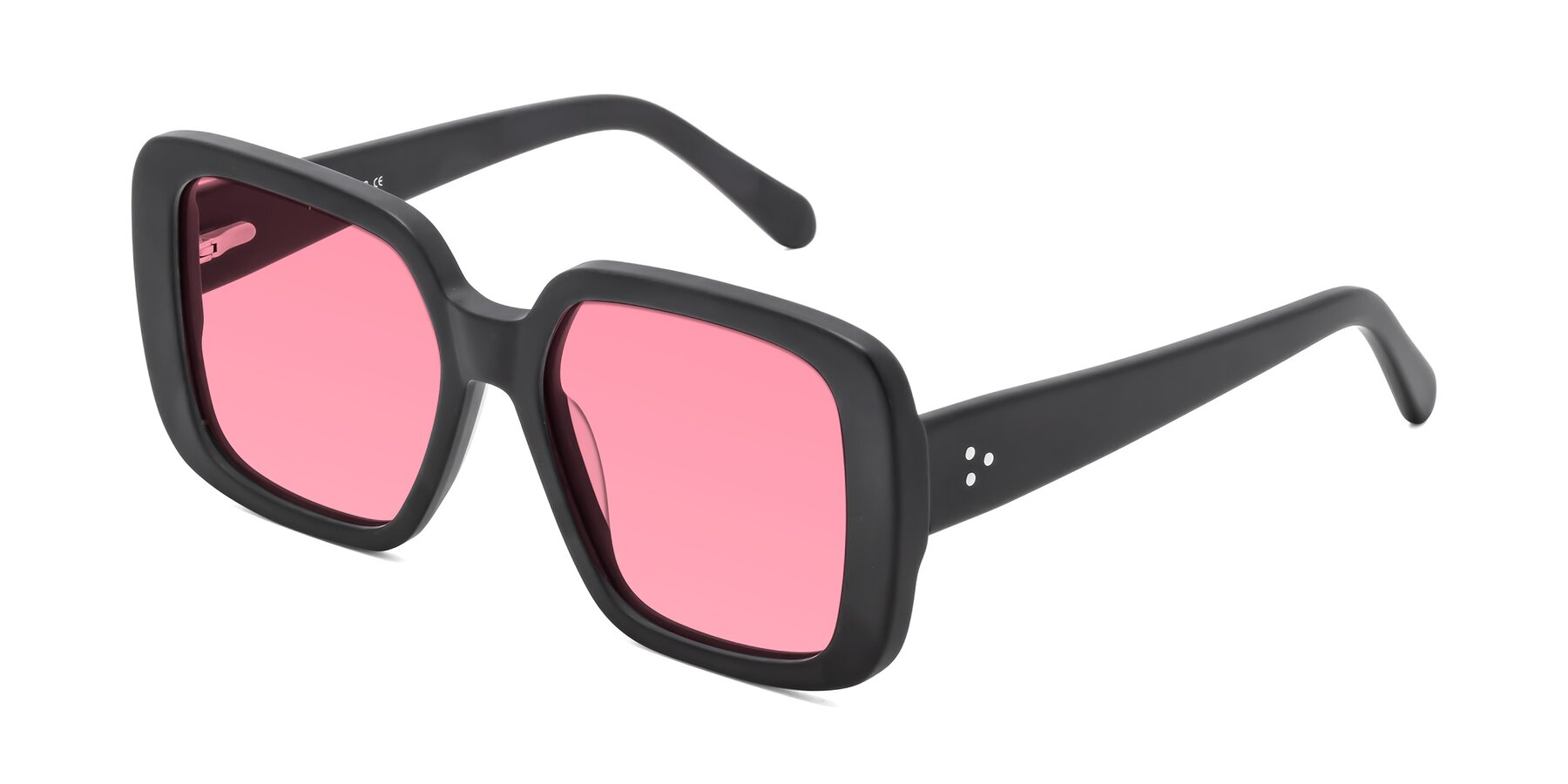 Angle of Quotus in Matte Black with Pink Tinted Lenses