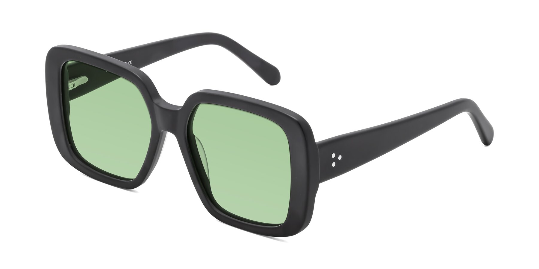 Angle of Quotus in Matte Black with Medium Green Tinted Lenses