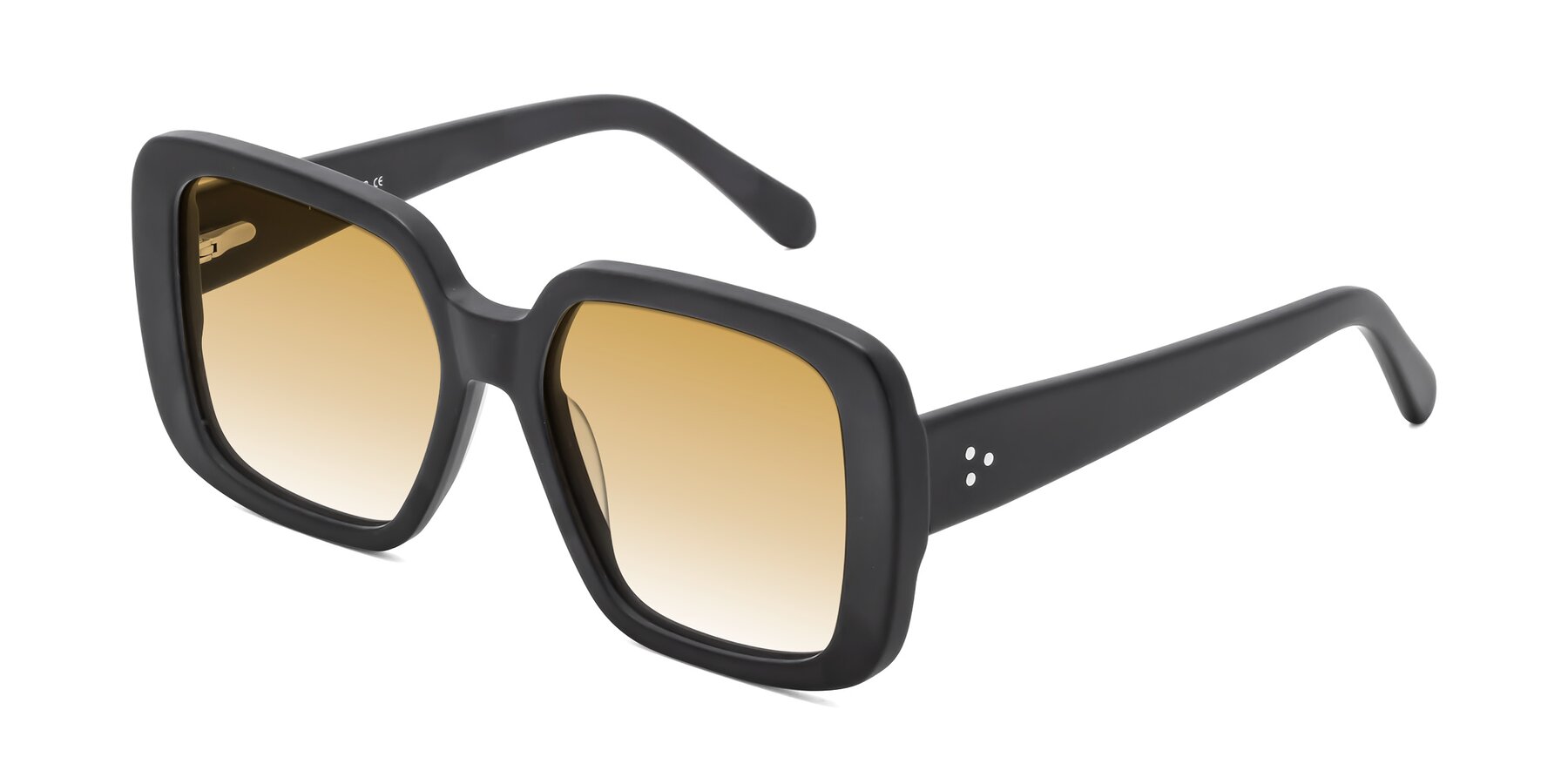 Angle of Quotus in Matte Black with Champagne Gradient Lenses