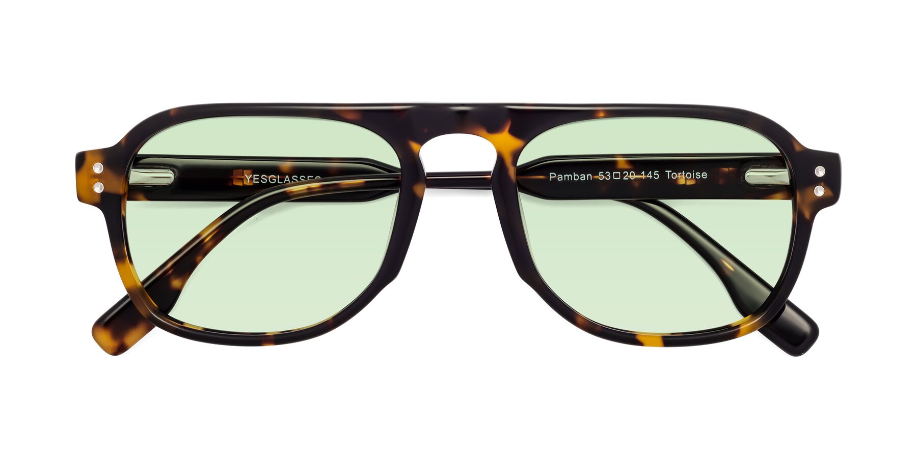 Folded Front of Pamban in Tortoise with Light Green Tinted Lenses