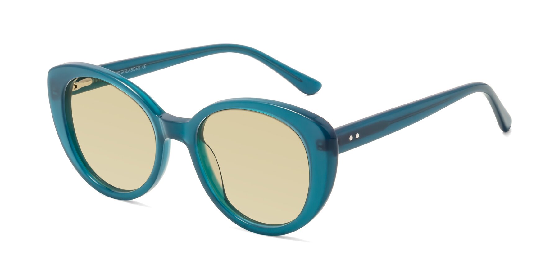 Angle of Pebble in Teal Blue with Light Champagne Tinted Lenses