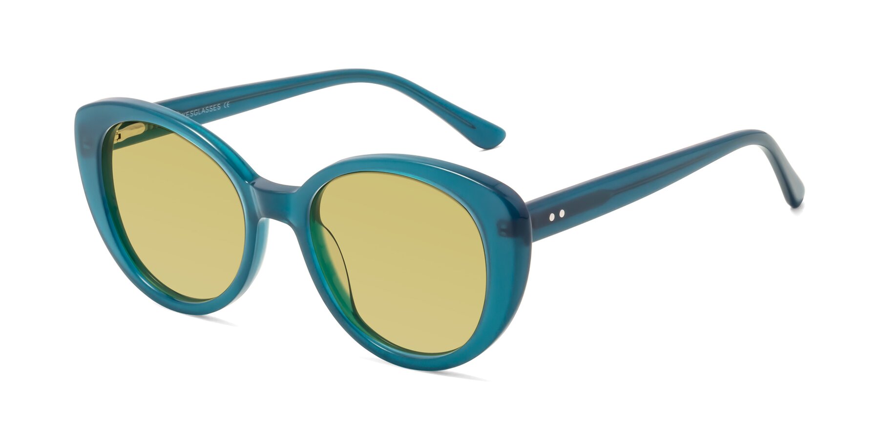 Angle of Pebble in Teal Blue with Medium Champagne Tinted Lenses