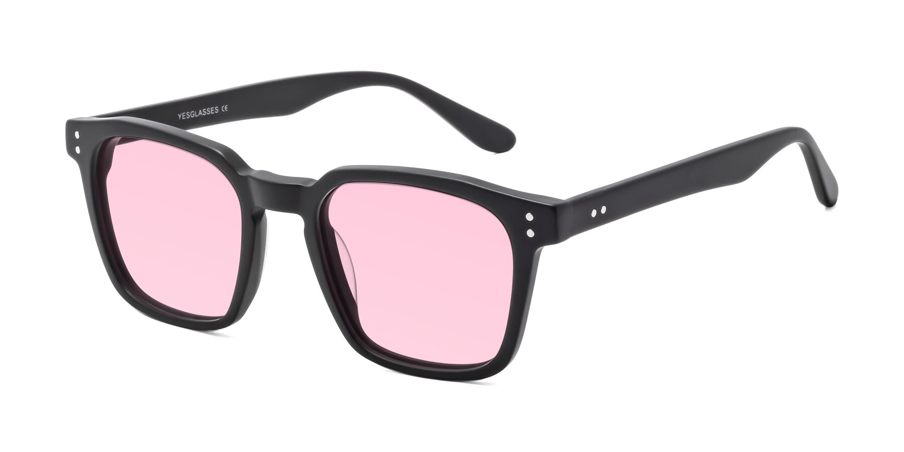 Angle of Riverside in Matte Black with Light Pink Tinted Lenses