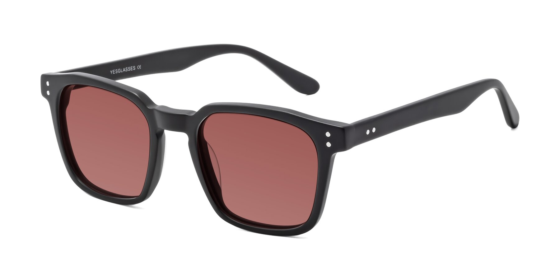 Angle of Riverside in Matte Black with Garnet Tinted Lenses