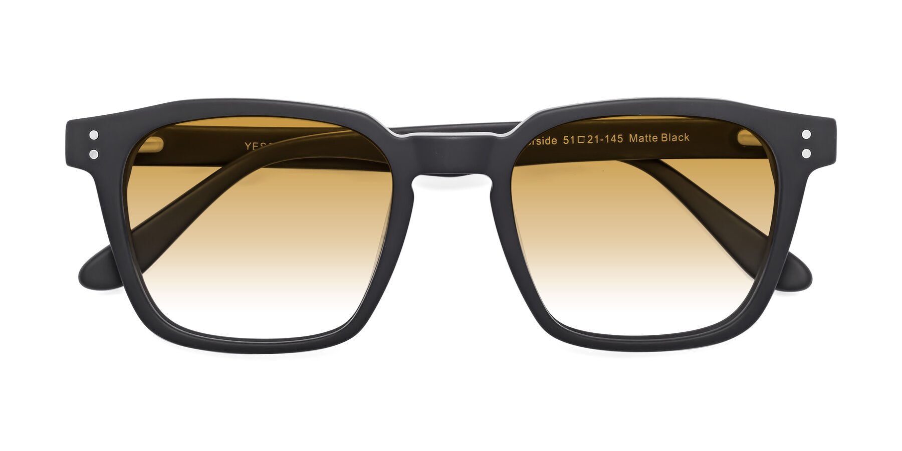 Folded Front of Riverside in Matte Black with Champagne Gradient Lenses
