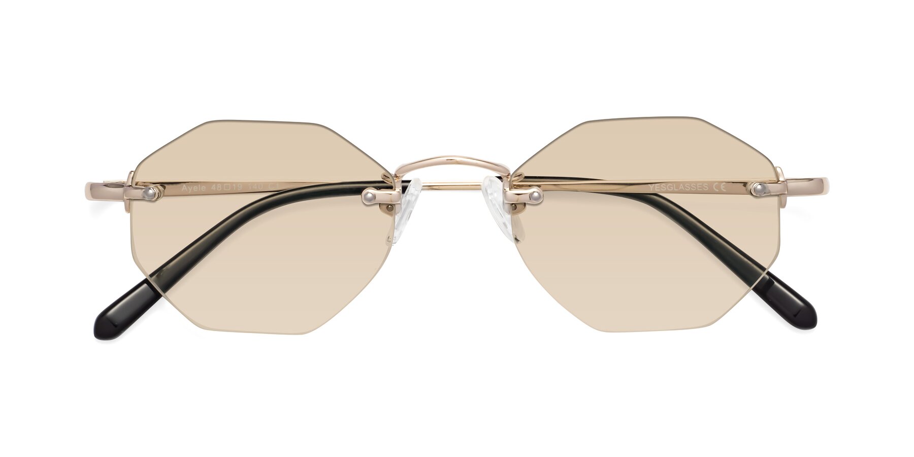 Folded Front of Ayele in Light Gold with Light Brown Tinted Lenses