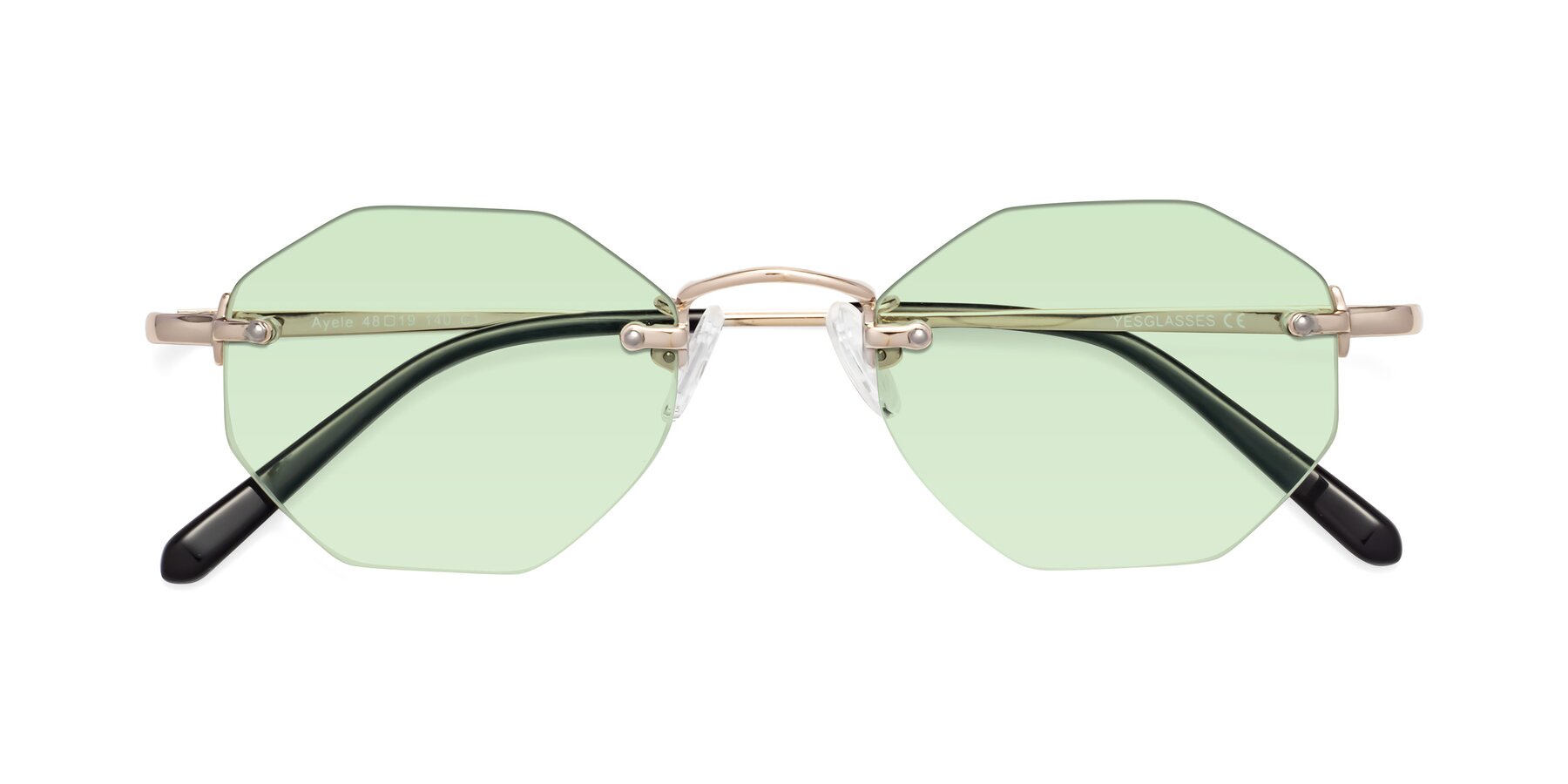 Folded Front of Ayele in Light Gold with Light Green Tinted Lenses