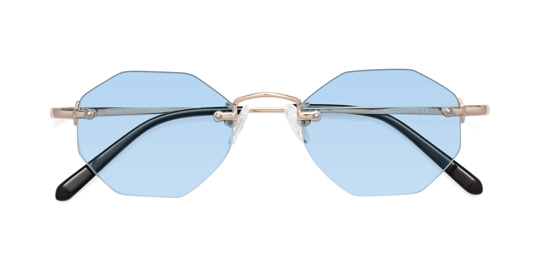 Folded Front of Ayele in Light Gold with Light Blue Tinted Lenses