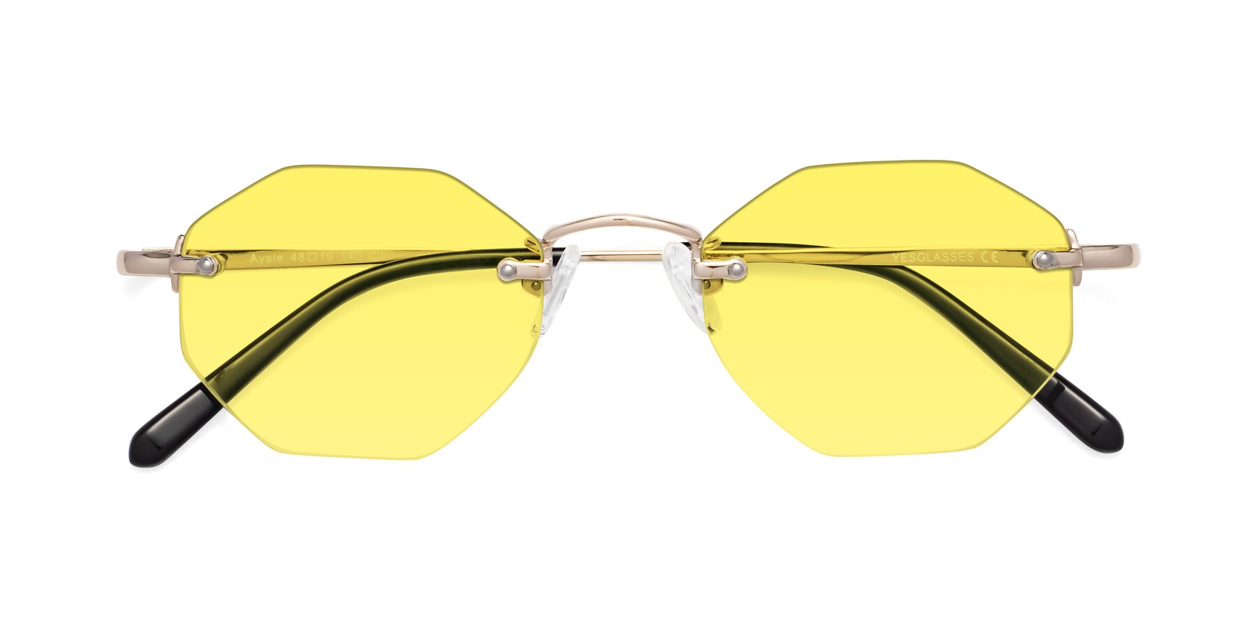 Folded Front of Ayele in Light Gold with Medium Yellow Tinted Lenses