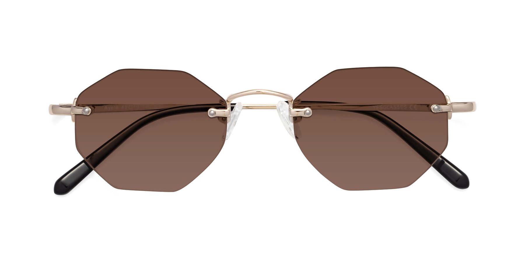 Folded Front of Ayele in Light Gold with Brown Tinted Lenses