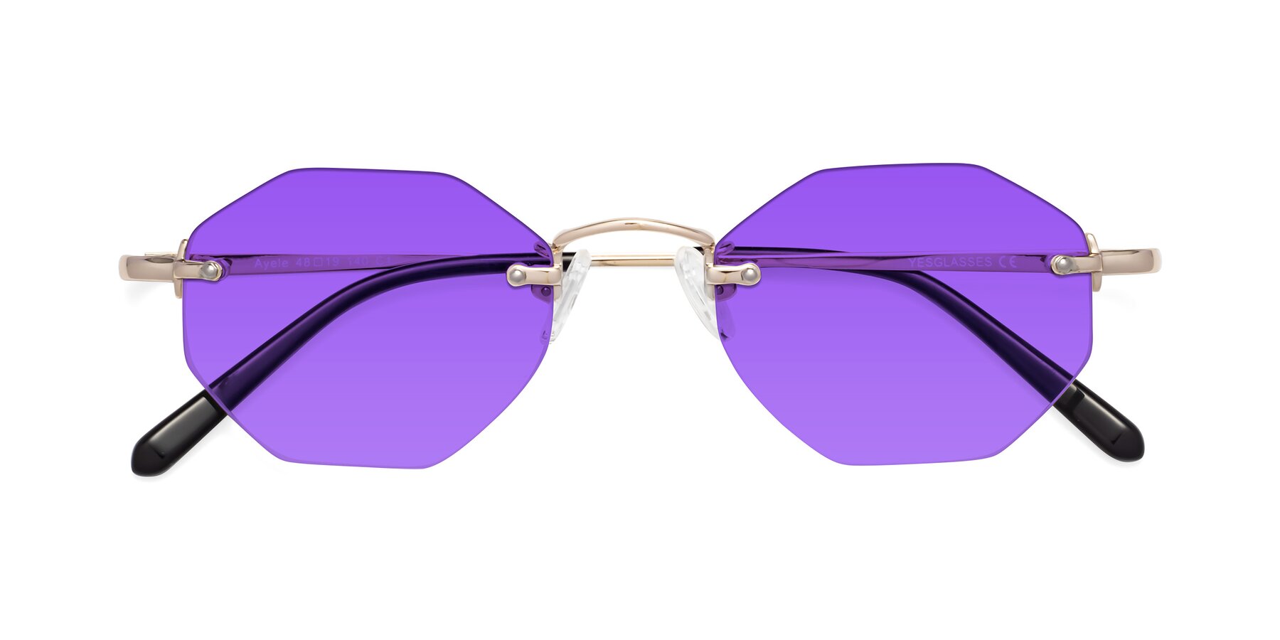 Folded Front of Ayele in Light Gold with Purple Tinted Lenses