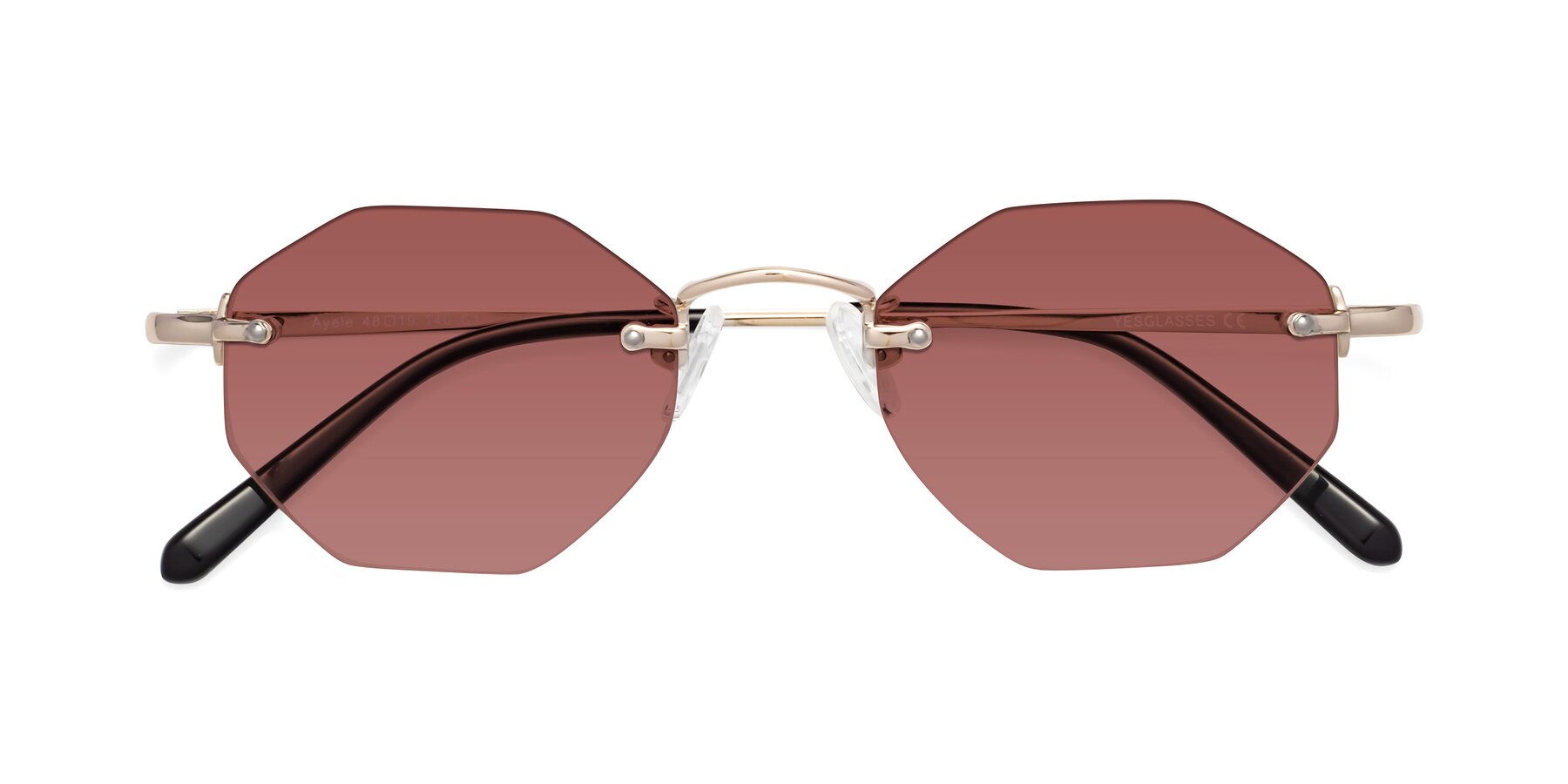 Folded Front of Ayele in Light Gold with Garnet Tinted Lenses