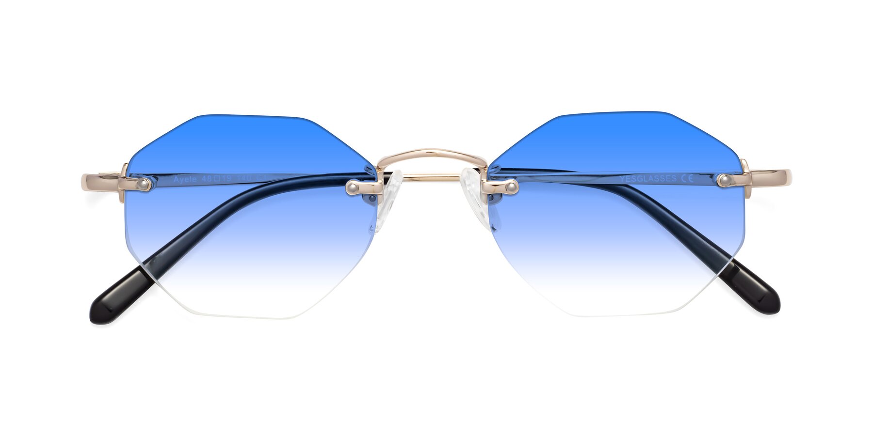 Folded Front of Ayele in Light Gold with Blue Gradient Lenses