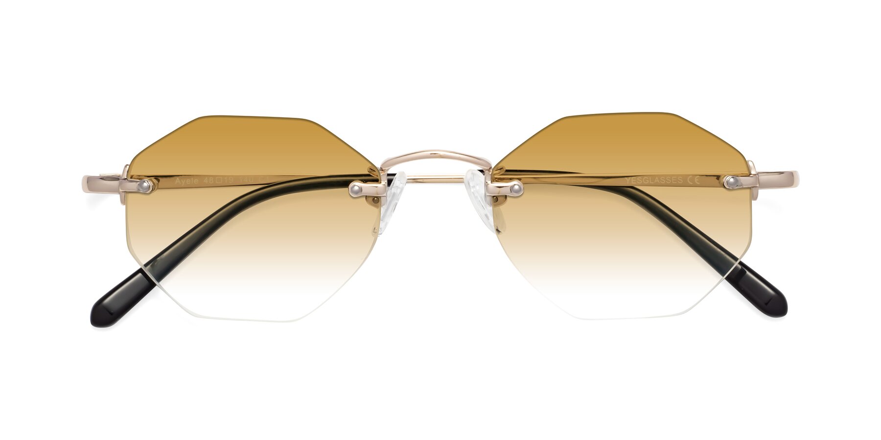 Folded Front of Ayele in Light Gold with Champagne Gradient Lenses