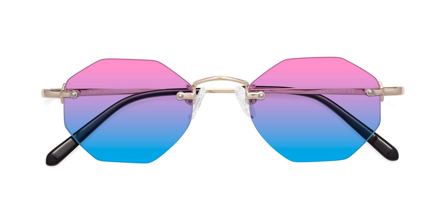 Folded Front of Ayele in Light Gold with Pink / Blue Gradient Lenses