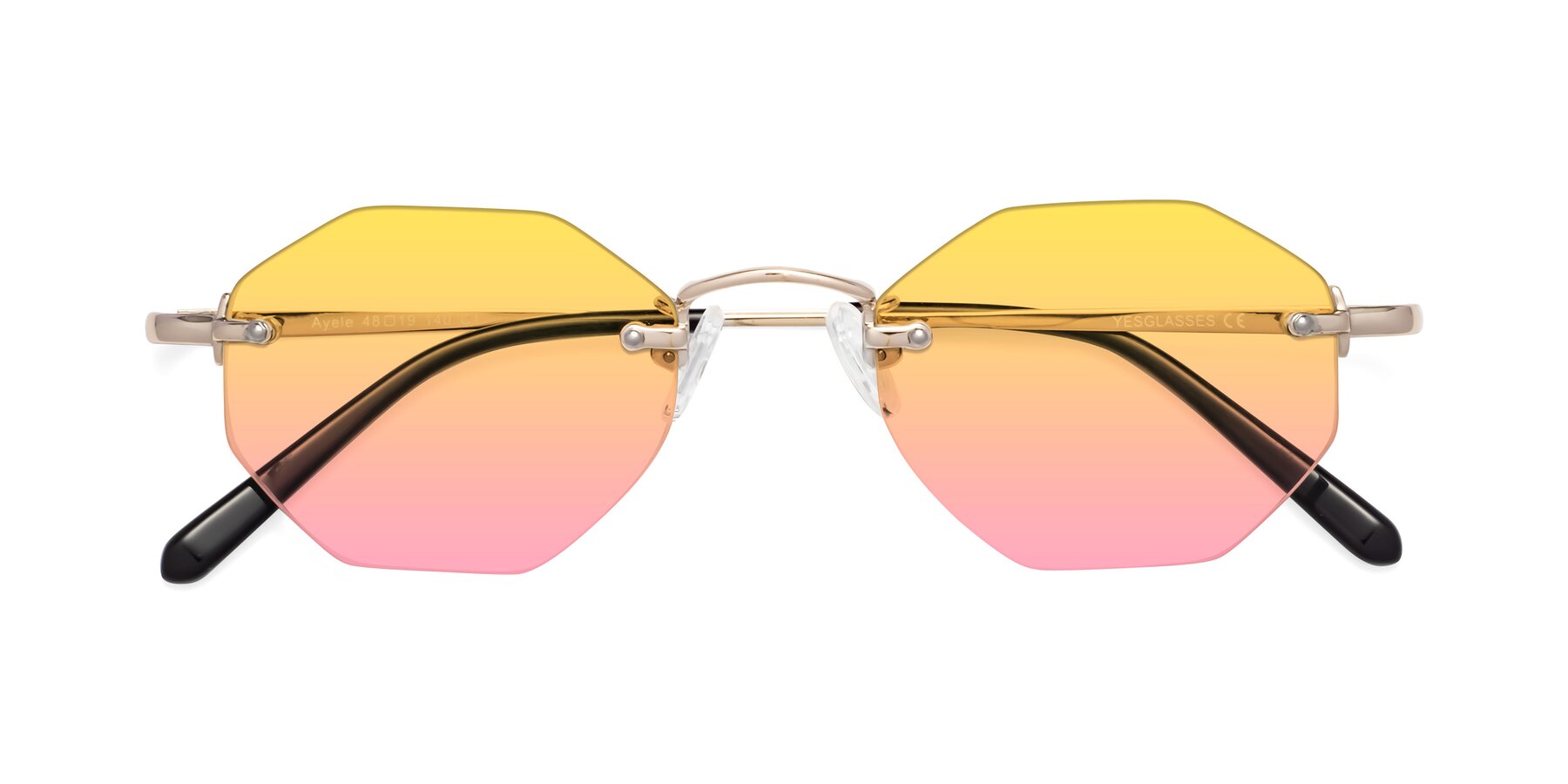 Folded Front of Ayele in Gold with Yellow / Pink Gradient Lenses