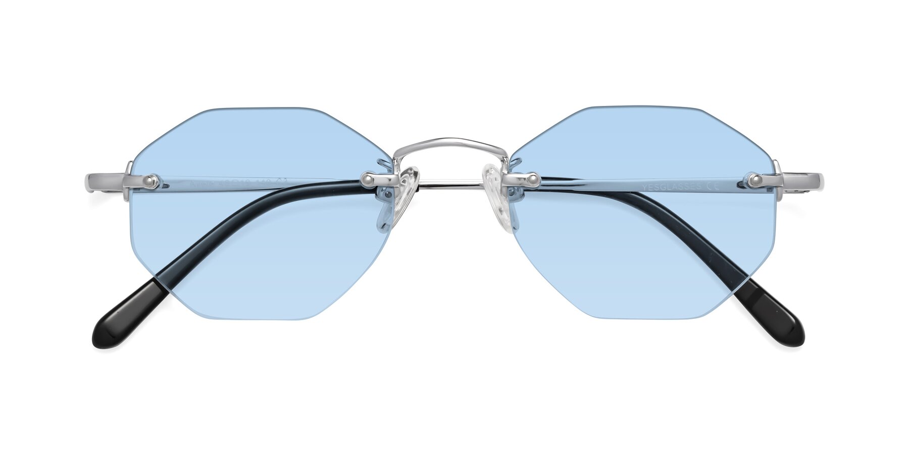 Folded Front of Ayele in Silver with Light Blue Tinted Lenses