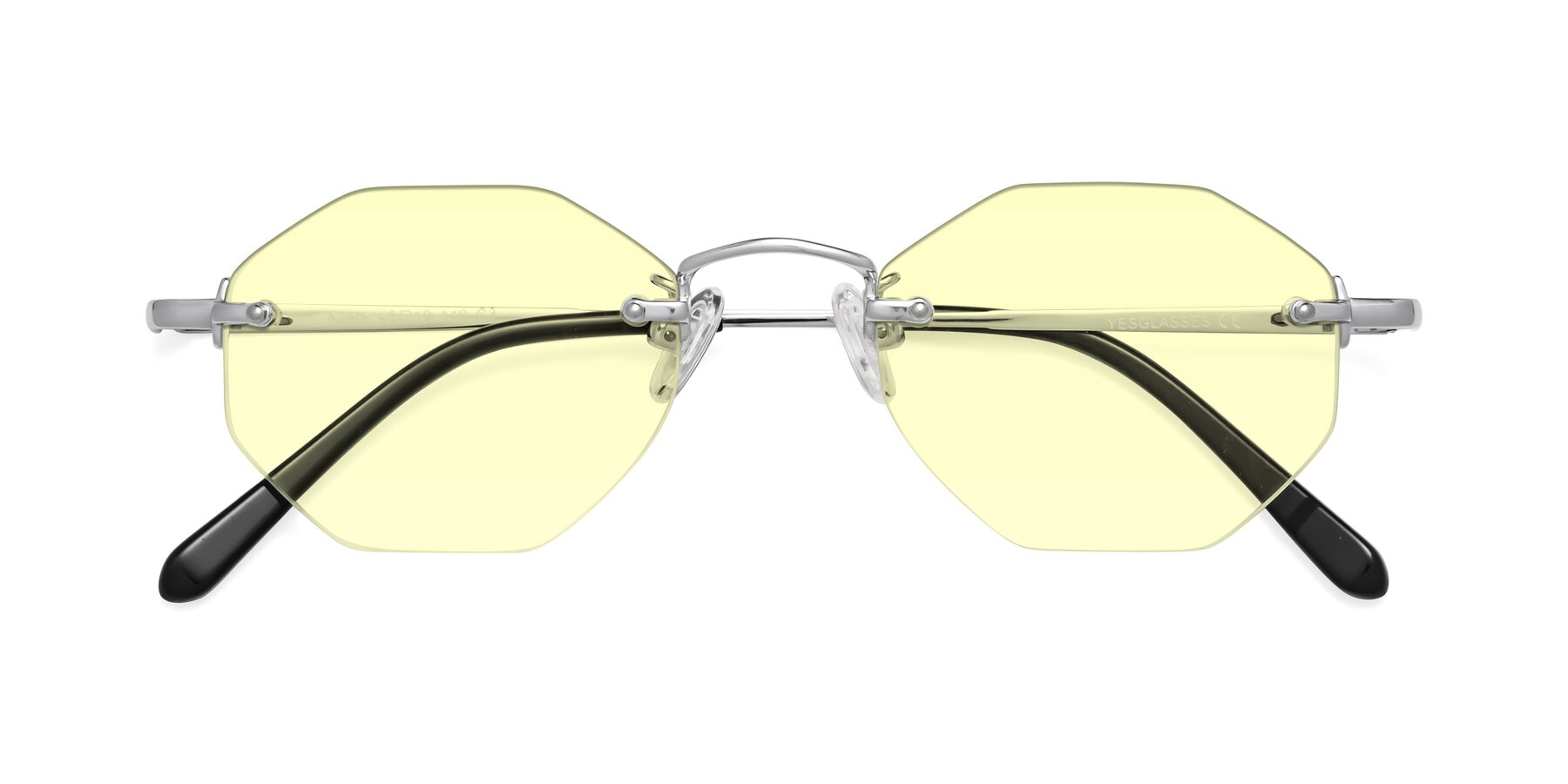 Folded Front of Ayele in Silver with Light Yellow Tinted Lenses