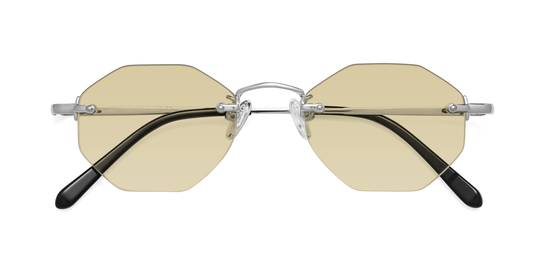 Folded Front of Ayele in Silver with Light Champagne Tinted Lenses