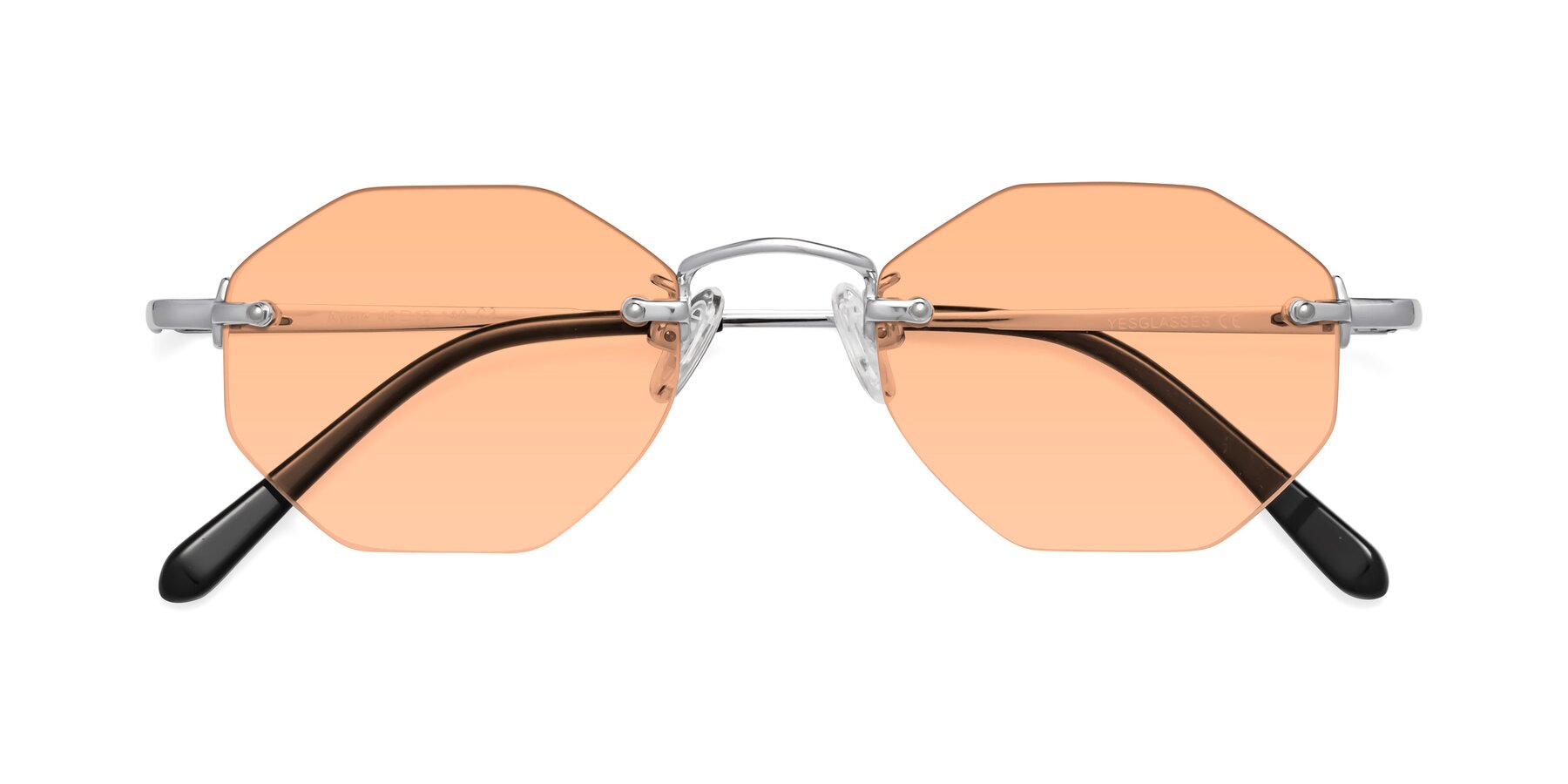 Folded Front of Ayele in Silver with Light Orange Tinted Lenses